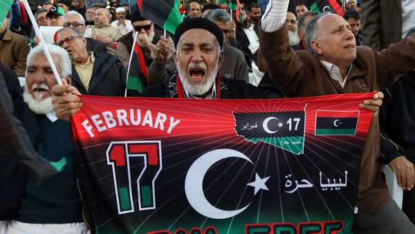Libyan protesters shout slogans during a demonstration against a UN-sponsored agreement on forming a national unity government, on December 11, 2015 in the capital Tripoli. - Sputnik International