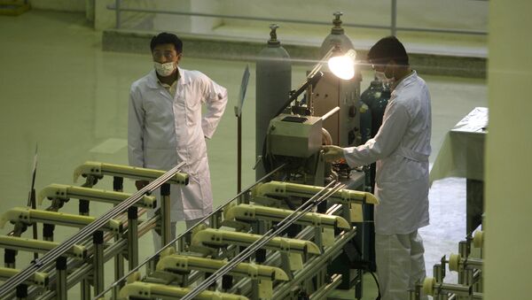 In this April 9, 2009 file picture Iranian technicians work at a new facility producing uranium fuel for a planned heavy-water nuclear reactor, just outside the city of Isfahan, 255 miles (410 kilometers) south of the capital Tehran - Sputnik International