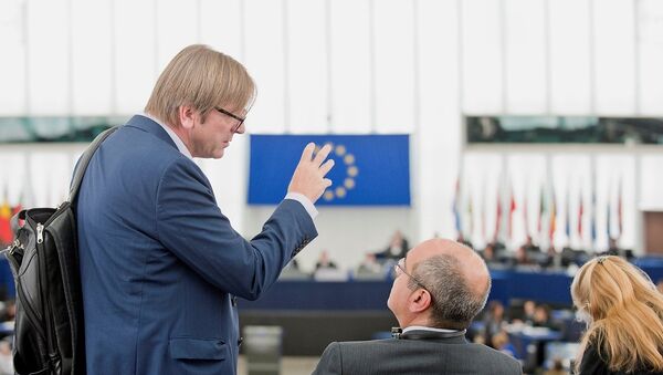 Ex-Belgium prime minister Guy Verhofstadt is talking at the entrance of the EP hemicycle in Strasbourg. - Sputnik International