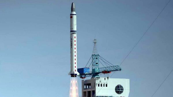 China's Long March 2-D carrier rocket carrying a Chinese-made satellite takes off from the Jiuquan Satellite Launch Center in northwest China's Gansu Province Monday, Nov. 3, 2003 - Sputnik International