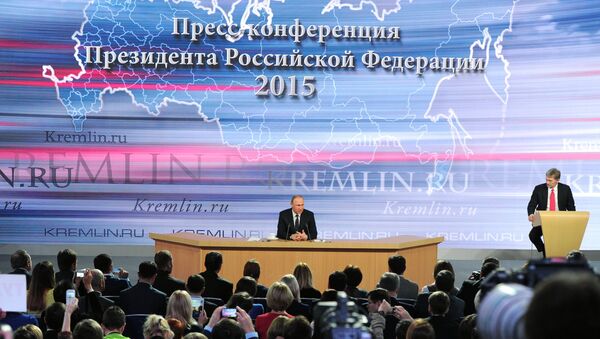 December 17, 2015. Russian President Vladimir Putin, center, at the 11th annual news conference at the World Trade Center on Krasnaya Presnya - Sputnik International