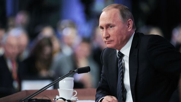 Президент России Владимир Путин на одиннадцатой большой ежегодной пресс-конференции в Центре международной торговли на Красной Пресне. - Sputnik International