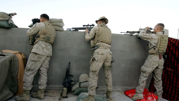 US marine sharpshooters with 3/6 Marines Recon Unit fire at insurgents and foreign fighters from a rooftopof a house the town of al-Qaim at the Iraqi-Syrian border (File) - Sputnik International