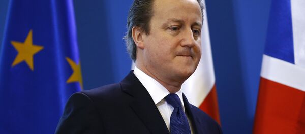 Britain's Prime Minister David Cameron arrives for a joint news conference with his Polish counterpart Beata Szydlo in Warsaw, Poland December 10, 2015 Britain's Prime Minister David Cameron arrives for a joint news conference with his Polish counterpart Beata Szydlo in Warsaw, Poland December 10, 2015 - Sputnik International