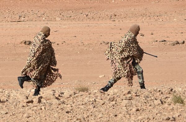 Snipers of Saudi Special forces run before taking a position during anti-terrorist exercises (File) Snipers of Saudi Special forces run before taking a position during anti-terrorist exercises (File) - Sputnik International