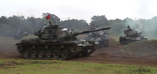 Taiwanese soldiers operate the US-made M60-A3 tanks during a military exercise in Hualien, Taiwan (File) - Sputnik International