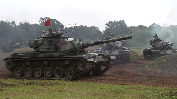Taiwanese soldiers operate the US-made M60-A3 tanks during a military exercise in Hualien, Taiwan (File) - Sputnik International