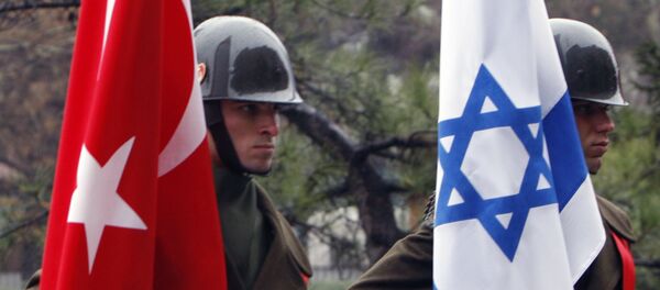Turkish honour guard soldiers hold an Israeli, right, and Turkish flag, Ankara, Turkey (File) Turkish honour guard soldiers hold an Israeli, right, and Turkish flag, Ankara, Turkey (File) - Sputnik International