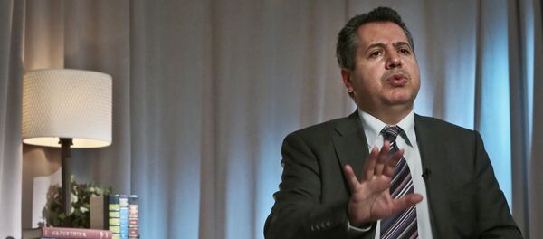 Dr. Najib Ghadbian, representative for the National Coalition of Syrian Revolution and Opposition Forces, speaks during an interview on Wednesday, Sept. 25, 2013 in New York Dr. Najib Ghadbian, representative for the National Coalition of Syrian Revolution and Opposition Forces, speaks during an interview on Wednesday, Sept. 25, 2013 in New York - Sputnik International