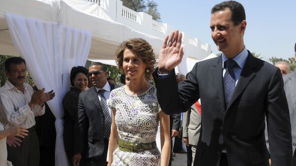 Syrian President Bashar Assad and his wife Asma Assad. (File)  - Sputnik International