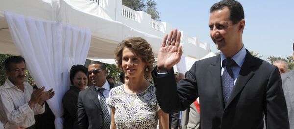 Syrian President Bashar Assad and his wife Asma Assad. (File) - Sputnik International
