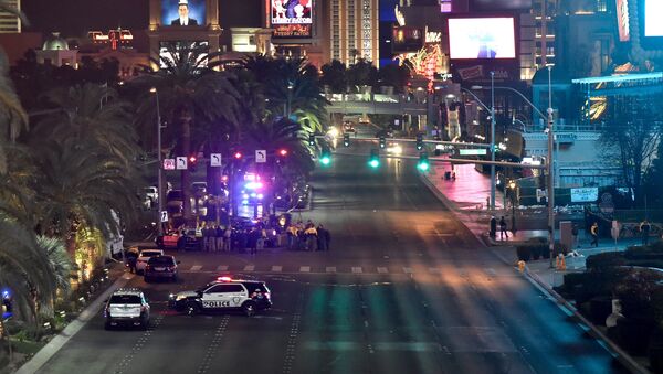 Las Vegas police investigate along the Las Vegas Strip following a traffic accident in front of the Planet Hollywood Hotel in Las Vegas, Nevada, near the hotel and casino where the Miss Universe pageant was being held, December 20, 2015 - Sputnik International