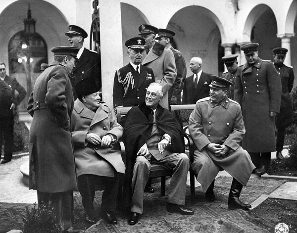 The Yalta (Crimean) conference of three allied powers on February 4-11, 1945. In the center (seating from left to right): British Prime Minister Winston Churchill, US President Franklin Delano Roosevelt and Marshal of the USSR Joseph Stalin The Yalta (Crimean) conference of three allied powers on February 4-11, 1945. In the center (seating from left to right): British Prime Minister Winston Churchill, US President Franklin Delano Roosevelt and Marshal of the USSR Joseph Stalin - Sputnik International