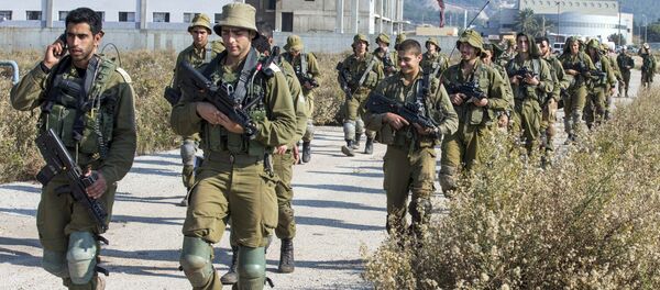 Israeli soldiers patrol the northern Israeli-Lebanon border Israeli soldiers patrol the northern Israeli-Lebanon border - Sputnik International