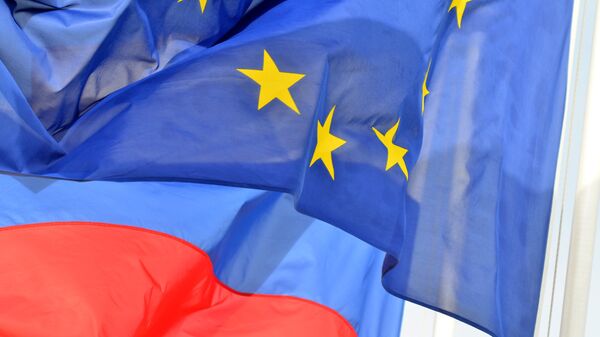 Flags of Russia, the EU - Sputnik International