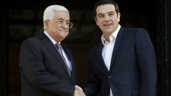 Greek Prime Minister Alexis Tsipras (R) welcomes Palestinian President Mahmoud Abbas at the Maximos Mansion in Athens, Greece, December 21, 2015. - Sputnik International