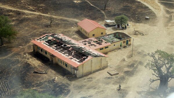This picture taken on March 5, 2015 shows an arial view of the burnt-out classrooms of a school in Chibok,in Northeastern Nigeria - Sputnik International