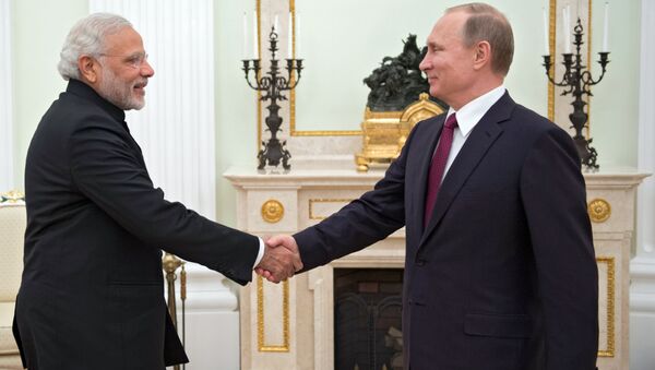 Russian President Vladimir Putin, right, meets with Indian Prime Minister Narendra Modi at the Moscow Kremlin - Sputnik International