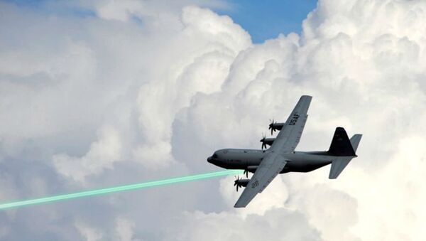 Photo illustration of an AC-130 gunship firing a laser weapon - Sputnik International
