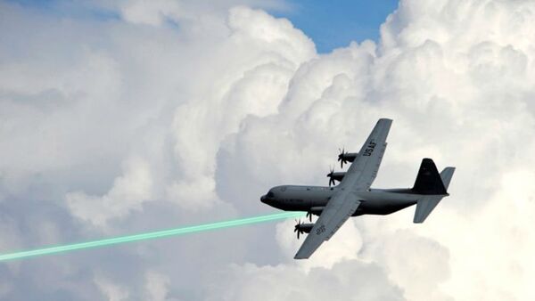Photo illustration of an AC-130 gunship firing a laser weapon - Sputnik International
