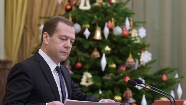 December 24, 2015. Russian Prime Minister Dmitry Medvedev chairs a meeting of the Russian Government at the Government House in Moscow - Sputnik International