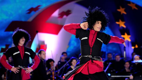 Georgia's dancers perform during celebrations for the signing of an association agreement with the EU in Tbilisi on June 27, 2014 - Sputnik International