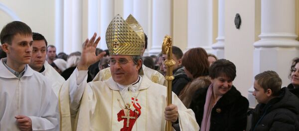 Roman Catholic Archbishop Ivan Jurkovic (center) conducts Easter Mass at the Roman Catholic Cathedral of the Immaculate Conception of the Blessed Virgin Mary Roman Catholic Archbishop Ivan Jurkovic (center) conducts Easter Mass at the Roman Catholic Cathedral of the Immaculate Conception of the Blessed Virgin Mary - Sputnik International
