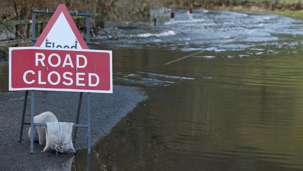 A road is closed due to flooding near the village of Pooley Bridge in North West England, December 10, 2015 - Sputnik International