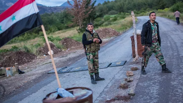 Syrian soldiers at a check point not far from Kesab, seized by Islamists, on the border with Turkey and the Latakiyah province (File) - Sputnik International