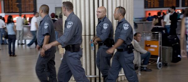 Israeli police officers walk through Ben Gurion airport near Tel Aviv , Israel Israeli police officers walk through Ben Gurion airport near Tel Aviv , Israel - Sputnik International