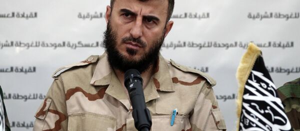 Zahran Alloush, the leader of Jaysh al-Islam (Islam Army) and military leader of the Islamic Front, attends a press conference with other brigade leaders in the rebel-held Eastern Ghouta region outside the capital Damascus on August 27, 2014, to announce the fomation of The Unified Military Command of Eastern Ghouta Zahran Alloush, the leader of Jaysh al-Islam (Islam Army) and military leader of the Islamic Front, attends a press conference with other brigade leaders in the rebel-held Eastern Ghouta region outside the capital Damascus on August 27, 2014, to announce the fomation of The Unified Military Command of Eastern Ghouta - Sputnik International