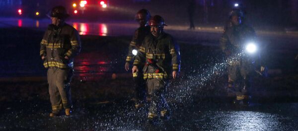 Birmingham firefighters work a scene after a tornado touched down in Jefferson County, Ala., damaging several houses, Friday, Dec. 25, 2015. - Sputnik International