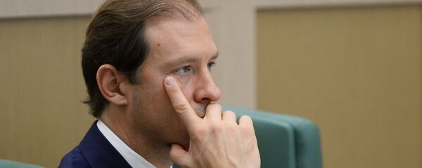 Russian Minister of Industry and Trade Denis Manturov at a Federation Council meeting - Sputnik International