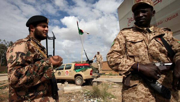 Libyan security forces stands guard in Benghazi, Libya (File) - Sputnik International