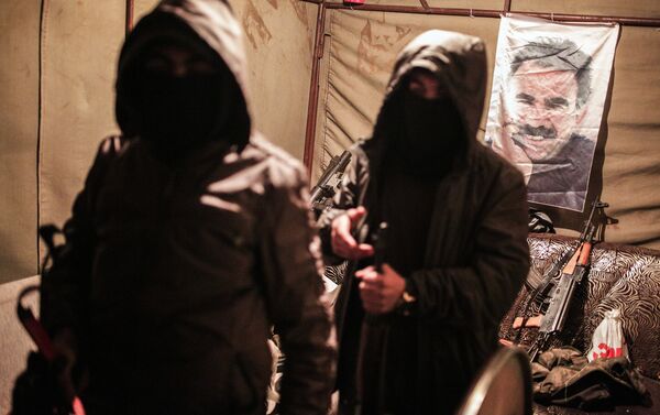Militants of the Kurdistan Workers' Party, or PKK, stand in a bunker in Sirnak, Turkey, late Wednesday, Dec. 23, 2015. - Sputnik International