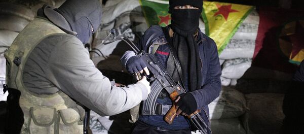 The militants of the Kurdistan Workers' Party, or PKK, stand at a barricade in Sirnak, Turkey, late Wednesday, Dec. 23, 2015. The militants of the Kurdistan Workers' Party, or PKK, stand at a barricade in Sirnak, Turkey, late Wednesday, Dec. 23, 2015. - Sputnik International