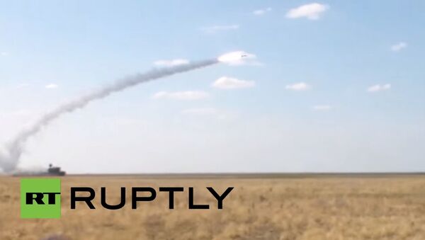 Mighty missiles fired from moving launcher Tor-M2U SAM - Sputnik International