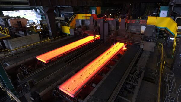 The picture shows red hot steel being flattened in the hot rolling plant at the ThyssenKrupp steel mill Hamborn pictured on December 12, 2014 in Duisburg , western Germany - Sputnik International