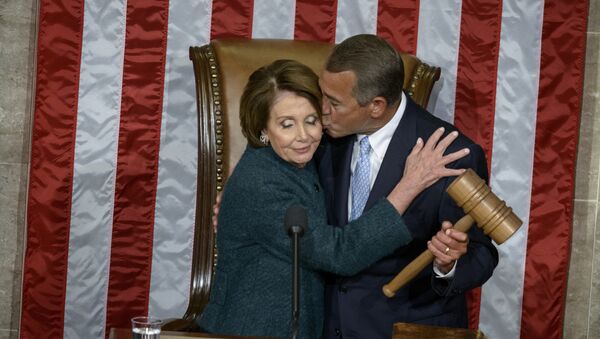 House Minority Leader Nancy Pelosi, D-CA, is kissed as she hands over the gavel to Speaker of the House John Boehner, R-OH, during a swearing-in ceremony in the House of Representatives as the 114th Congress convenes on Capitol Hill January 6, 2015 in Washington, DC - Sputnik International