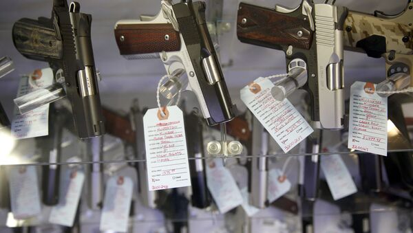 Handguns in a display case at Metro Shooting Supplies, in Bridgeton, Mo. - Sputnik International