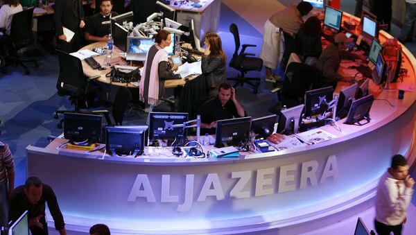 A general view shows the newsroom at the headquarters of the Qatar-based Al-Jazeera satellite channel in Doha - Sputnik International