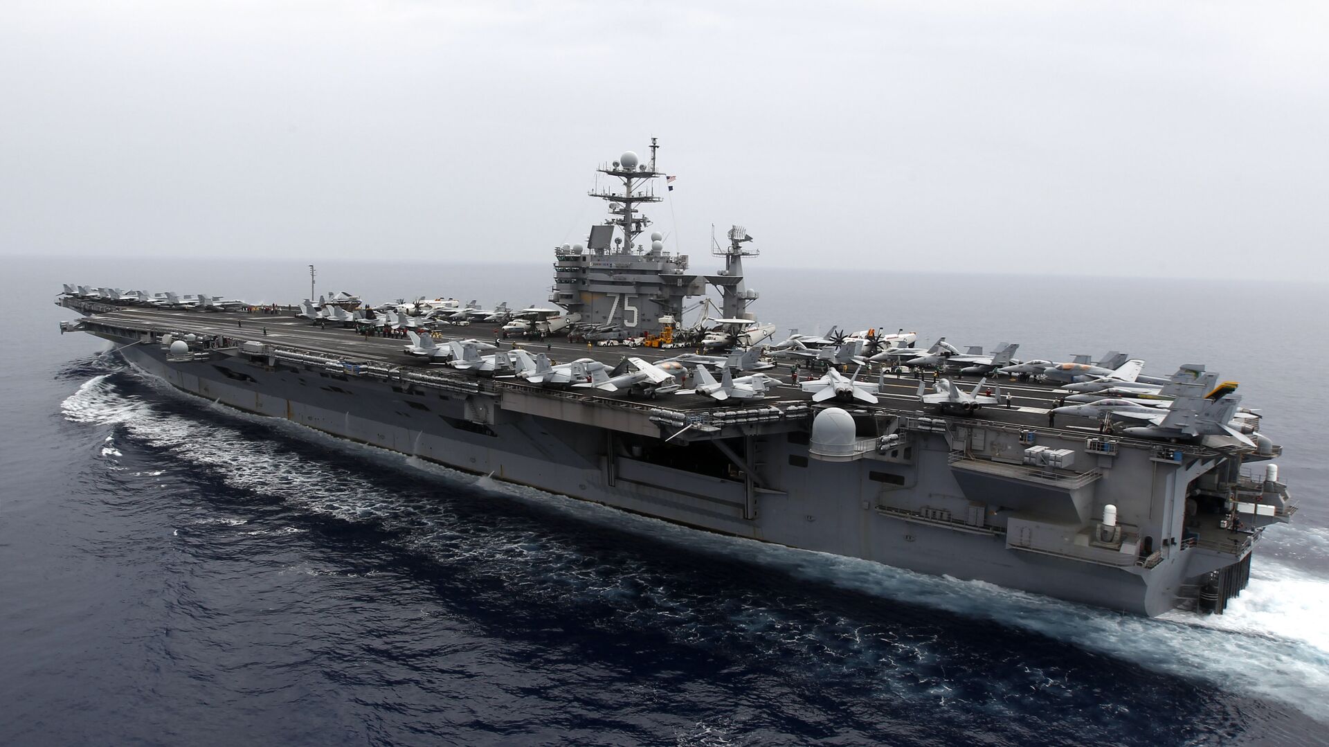 A general view shows the nuclear-powered aircraft carrier USS Harry S. Truman at an undisclosed position in the Mediterranean Sea, south of Sicily, Monday June 14, 2010 - Sputnik International, 1920, 28.12.2021