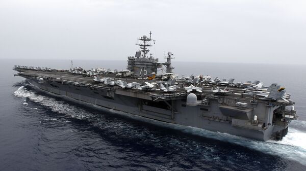 A general view shows the nuclear-powered aircraft carrier USS Harry S. Truman at an undisclosed position in the Mediterranean Sea, south of Sicily, Monday June 14, 2010 - Sputnik International