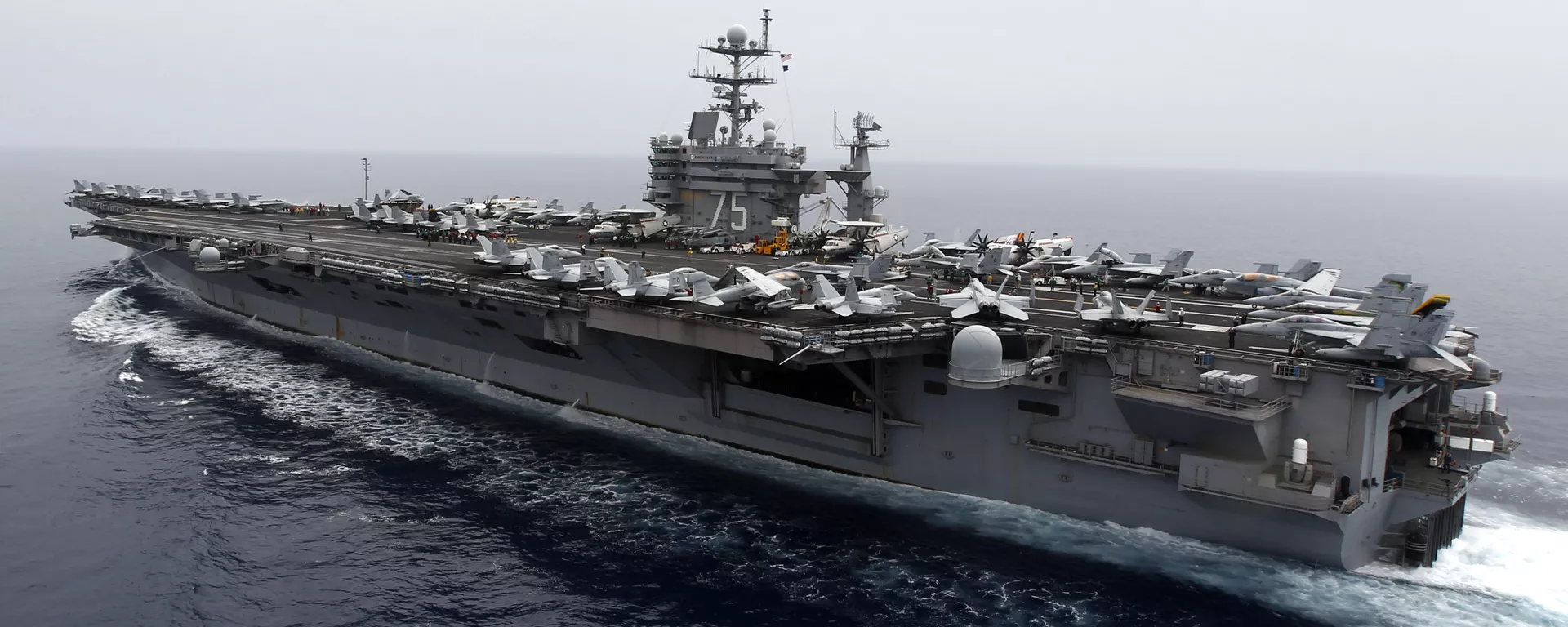 A general view shows the nuclear-powered aircraft carrier USS Harry S. Truman at an undisclosed position in the Mediterranean Sea, south of Sicily, Monday June 14, 2010 - Sputnik International, 1920, 15.01.2025