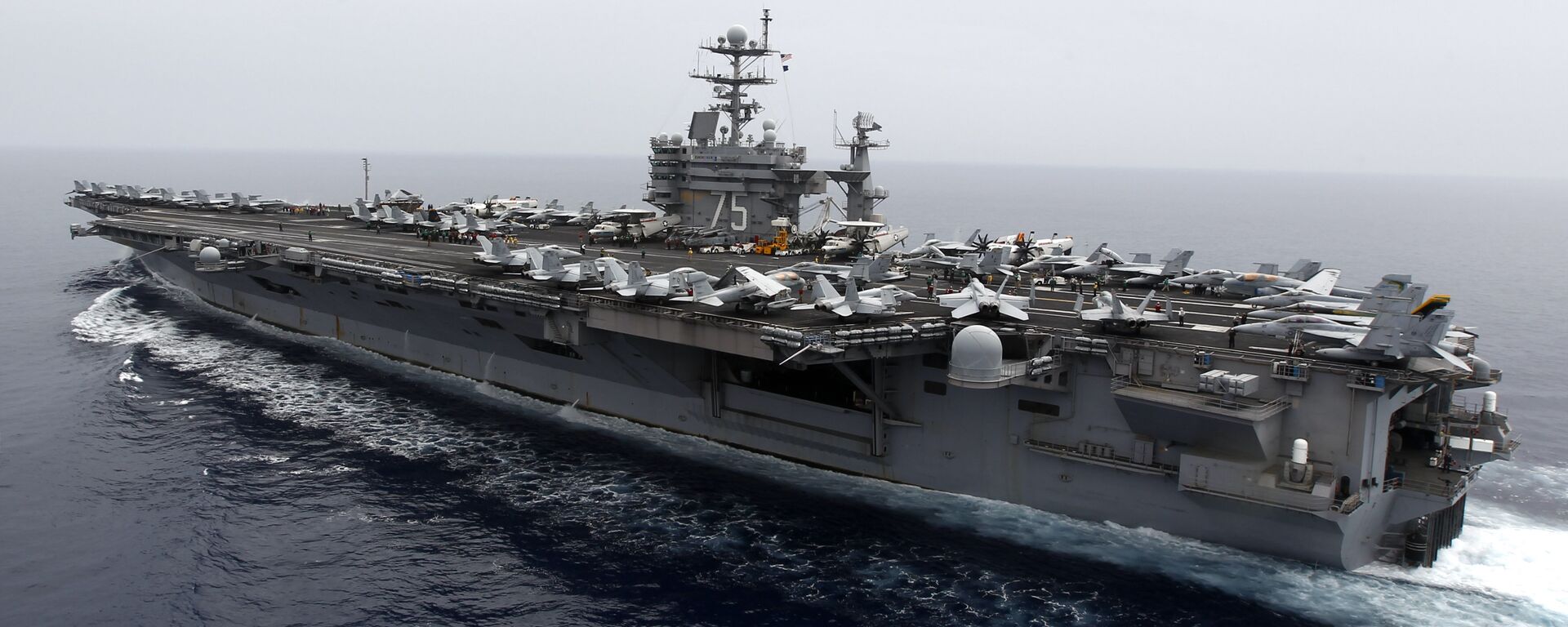 A general view shows the nuclear-powered aircraft carrier USS Harry S. Truman at an undisclosed position in the Mediterranean Sea, south of Sicily, Monday June 14, 2010 - Sputnik International, 1920, 22.03.2022