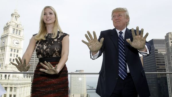 Real estate developer Donald Trump and his daughter Ivanka place their hands in concrete during topping off festivities for the 92-story Trump International Hotel and Tower in Chicago, Wednesday, Sept. 24, 2008. - Sputnik International