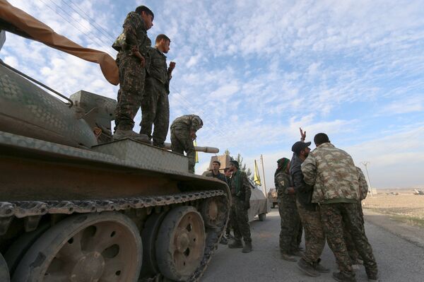 Fighters from the Democratic Forces of Syria prepare themselves ahead of what they said was an offensive against Islamic State militants to take control of Tishrin dam, south of Kobani, Syria December 26, 2015 Fighters from the Democratic Forces of Syria prepare themselves ahead of what they said was an offensive against Islamic State militants to take control of Tishrin dam, south of Kobani, Syria December 26, 2015 - Sputnik International