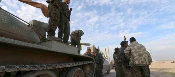 Fighters from the Democratic Forces of Syria prepare themselves ahead of what they said was an offensive against Islamic State militants to take control of Tishrin dam, south of Kobani, Syria December 26, 2015 Fighters from the Democratic Forces of Syria prepare themselves ahead of what they said was an offensive against Islamic State militants to take control of Tishrin dam, south of Kobani, Syria December 26, 2015 - Sputnik International