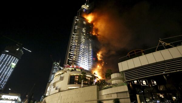 A fire engulfs The Address Hotel in downtown Dubai in the United Arab Emirates. - Sputnik International