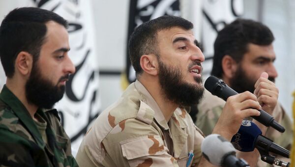 Zahran Alloush (C), commander of Jaysh al Islam, talks during a conference in the town of Douma, eastern Ghouta in Damascus, Syria August 27, 2014 - Sputnik International